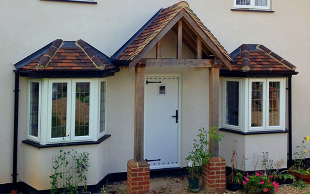 cottage door with stud work and oak porch